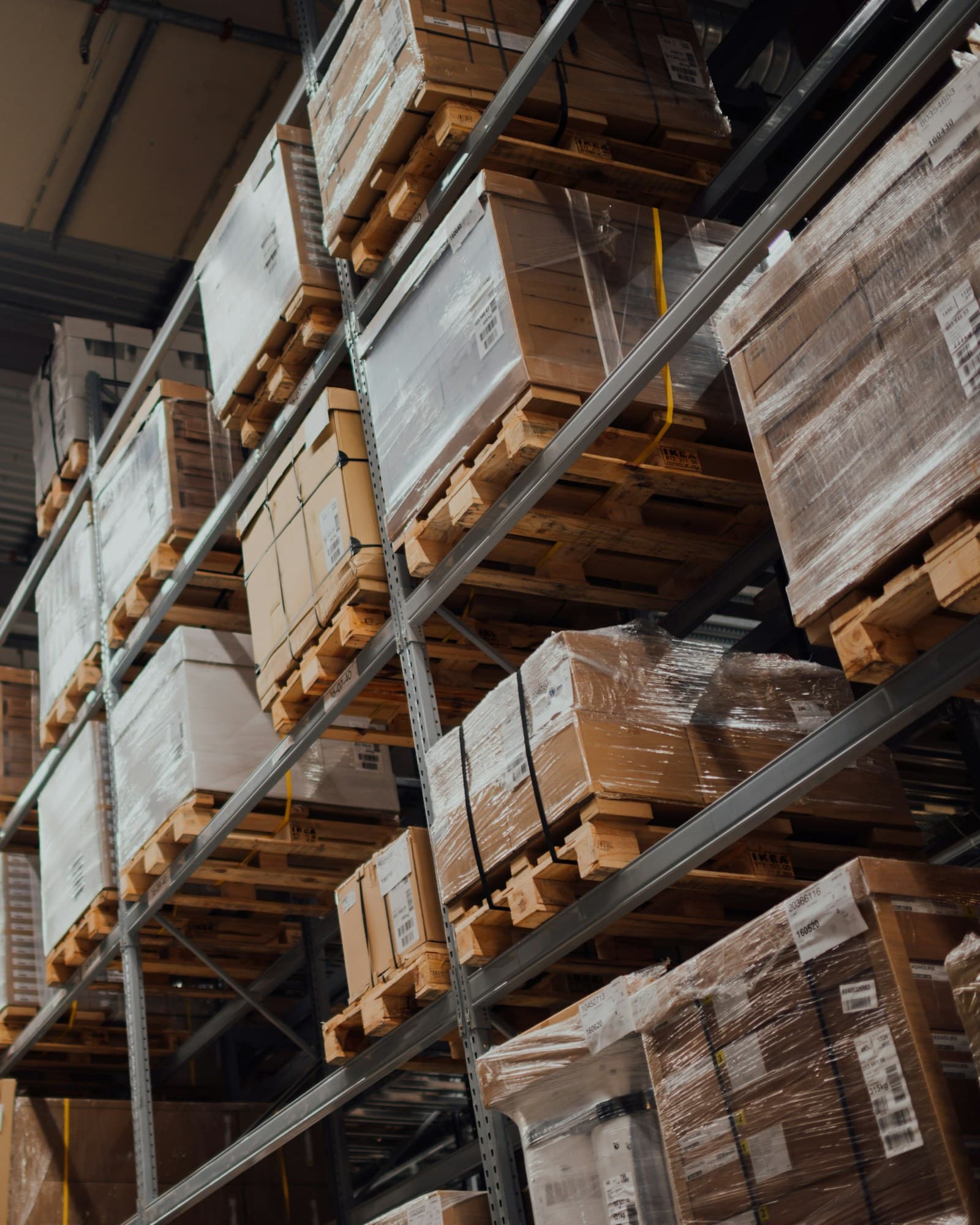 Cardboard boxes stacked on warehouse racks